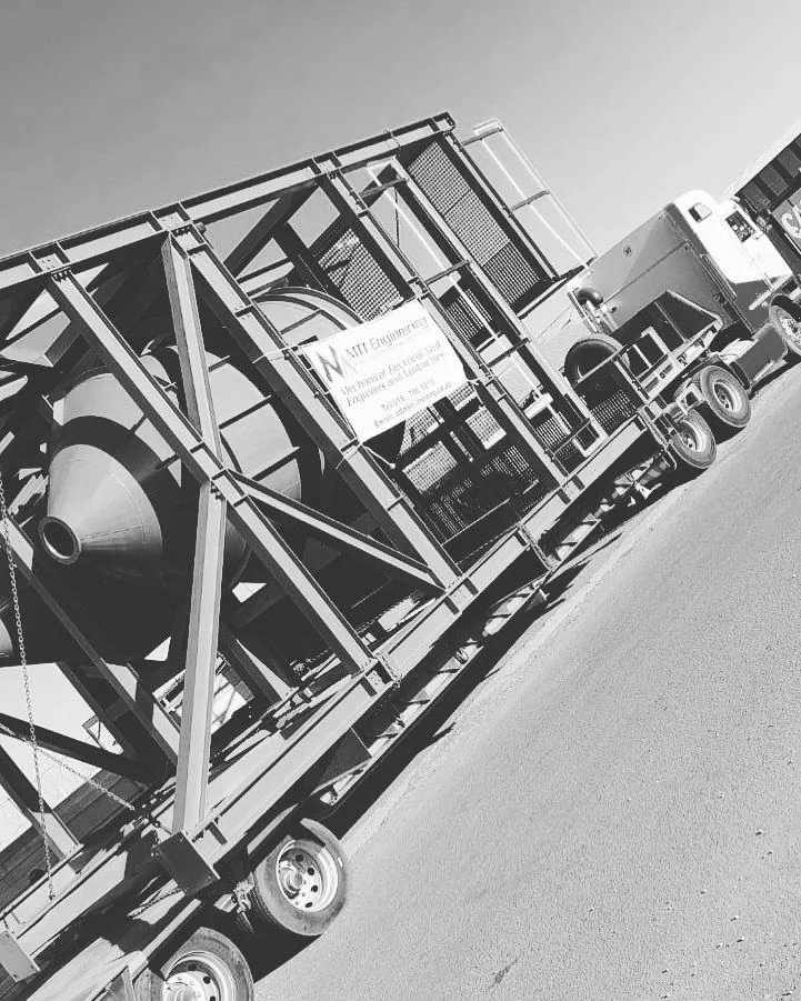 Fabricated structural steel assembly loaded on a truck for delivery